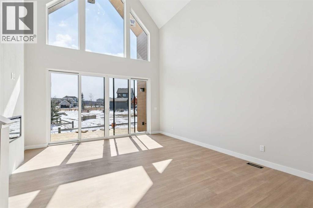 37 Cottageclub Lane, Rural Rocky View County, Alberta  T4C 1B1 - Photo 8 - A2303149