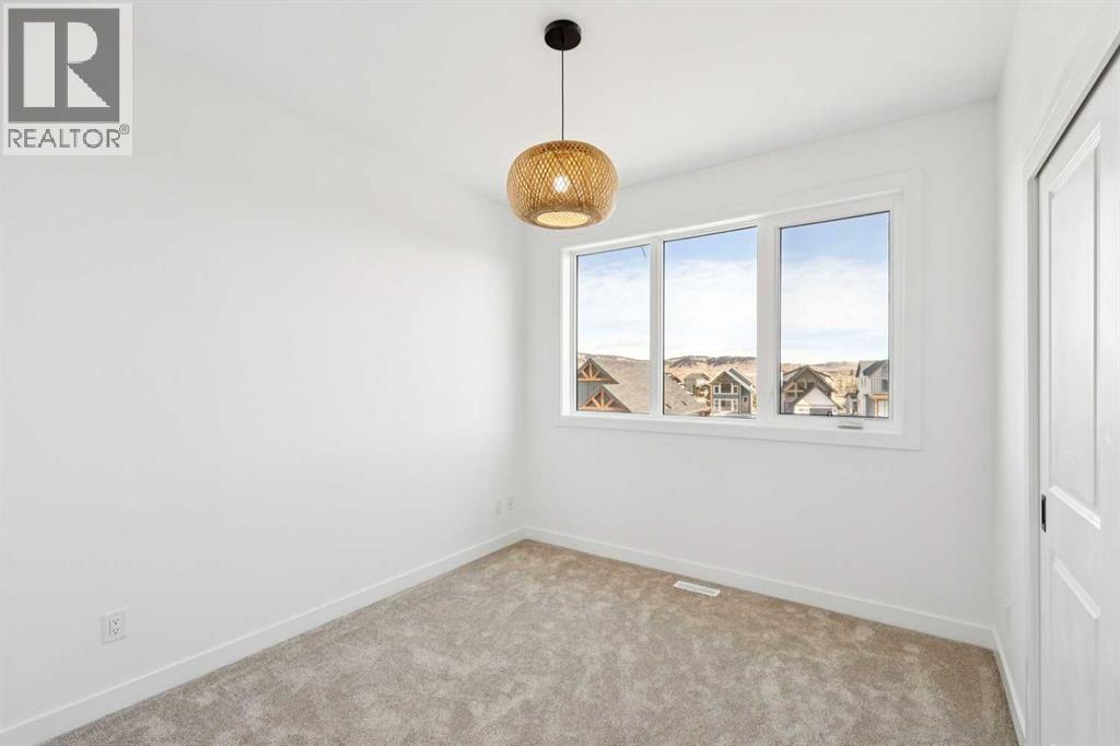 638 Cottageclub Bend, Rural Rocky View County, Alberta  T4C 1B1 - Photo 15 - A2303174