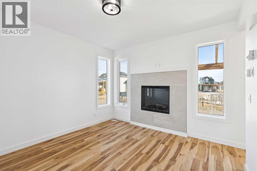 638 Cottageclub Bend, Rural Rocky View County, Alberta  T4C 1B1 - Photo 11 - A2303174