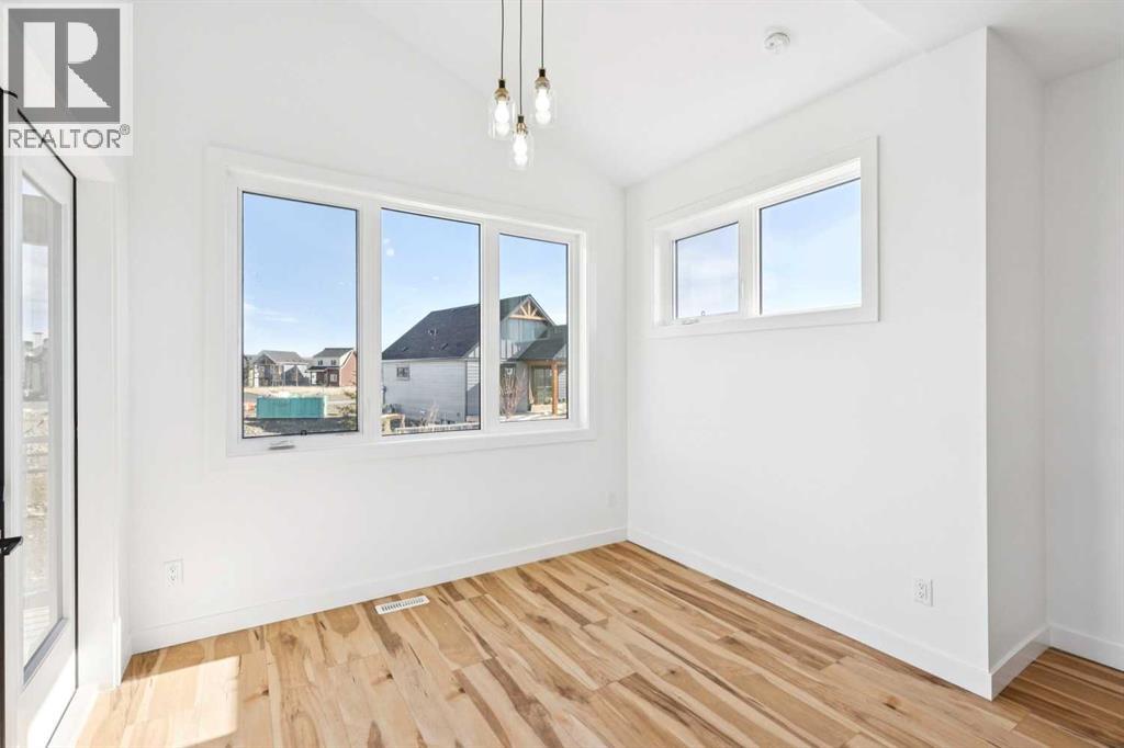 638 Cottageclub Bend, Rural Rocky View County, Alberta  T4C 1B1 - Photo 8 - A2303174