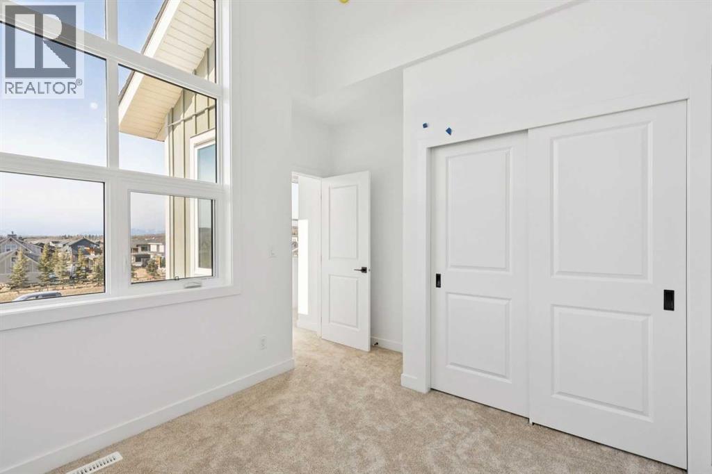 638 Cottageclub Bend, Rural Rocky View County, Alberta  T4C 1B1 - Photo 16 - A2303174