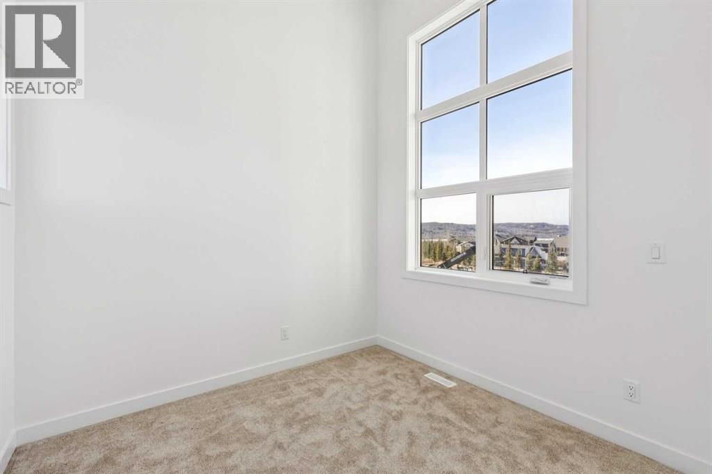 638 Cottageclub Bend, Rural Rocky View County, Alberta  T4C 1B1 - Photo 17 - A2303174