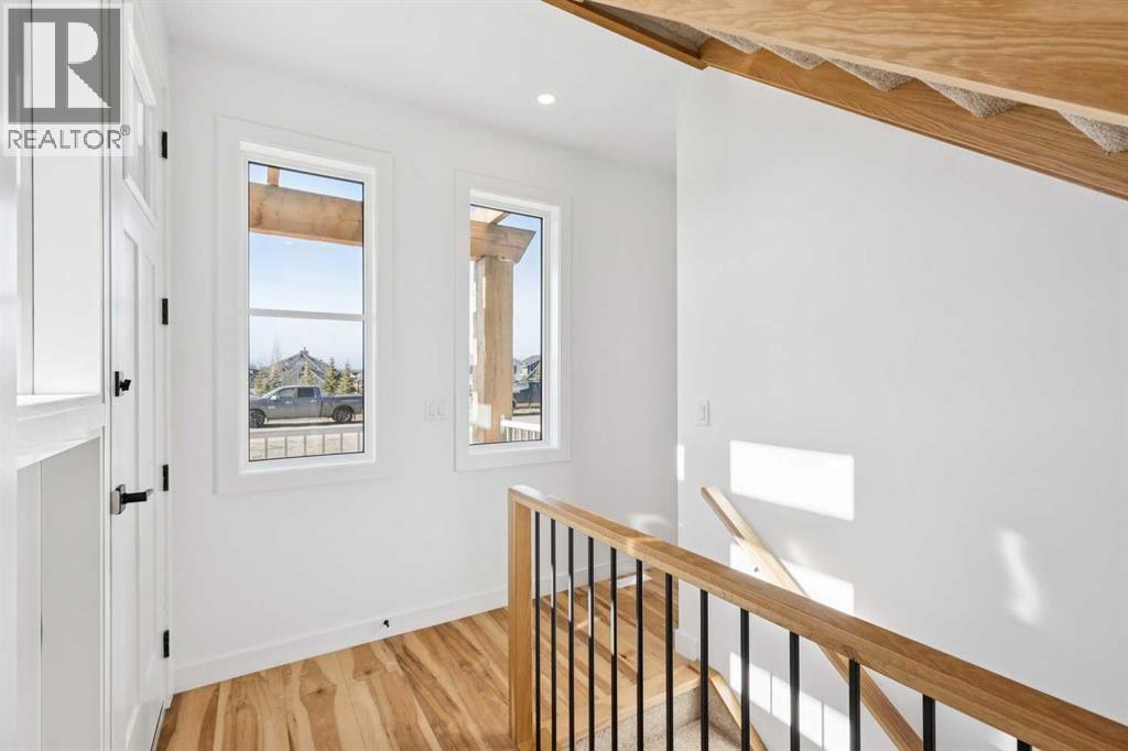 638 Cottageclub Bend, Rural Rocky View County, Alberta  T4C 1B1 - Photo 3 - A2303174