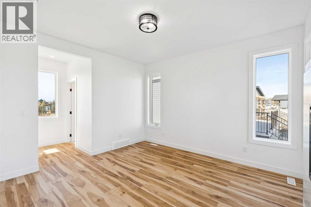 638 Cottageclub Bend, Rural Rocky View County, Alberta  T4C 1B1 - Photo 10 - A2303174