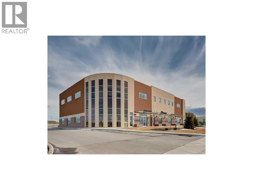 220, 52 Gateway Drive NE, Airdrie, Alberta  T4B 0J6 - Photo 1 - A2301140