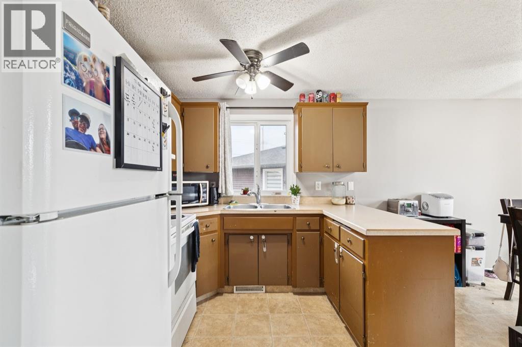 157 Penbrooke Close SE, Calgary, Alberta  T2A 3N9 - Photo 4 - A2284508