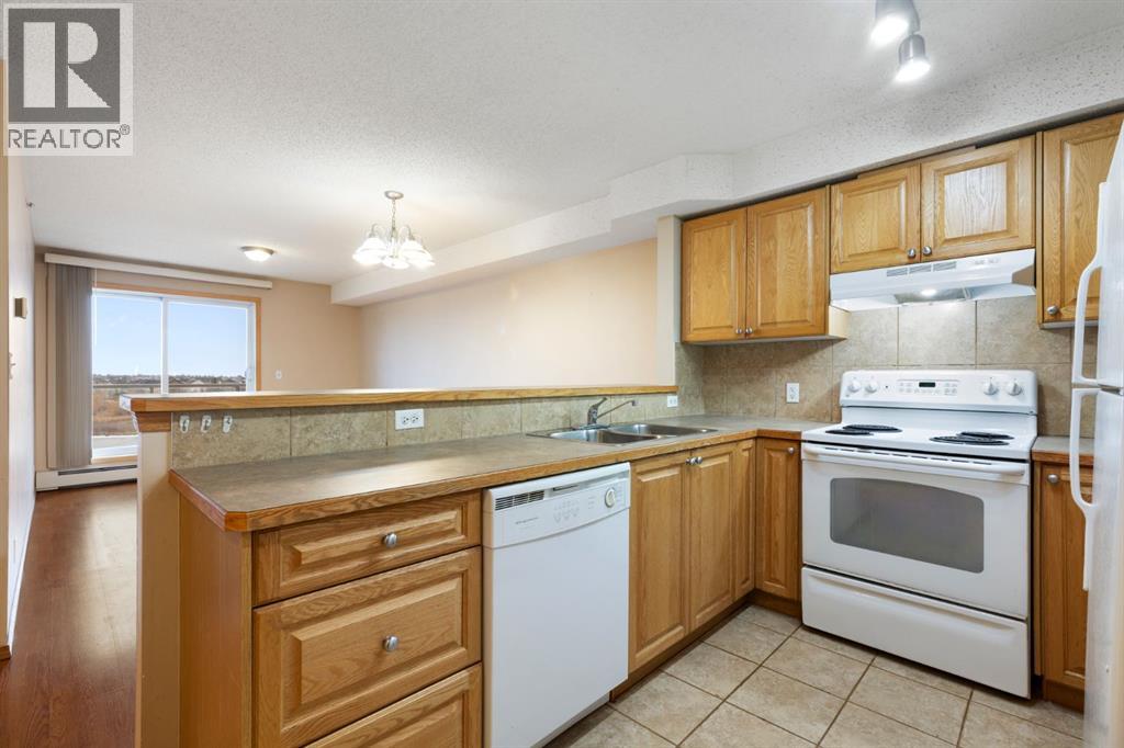 311, 92 Saddletree Court NE, Calgary, Alberta  T3J 0K9 - Photo 3 - A2302280
