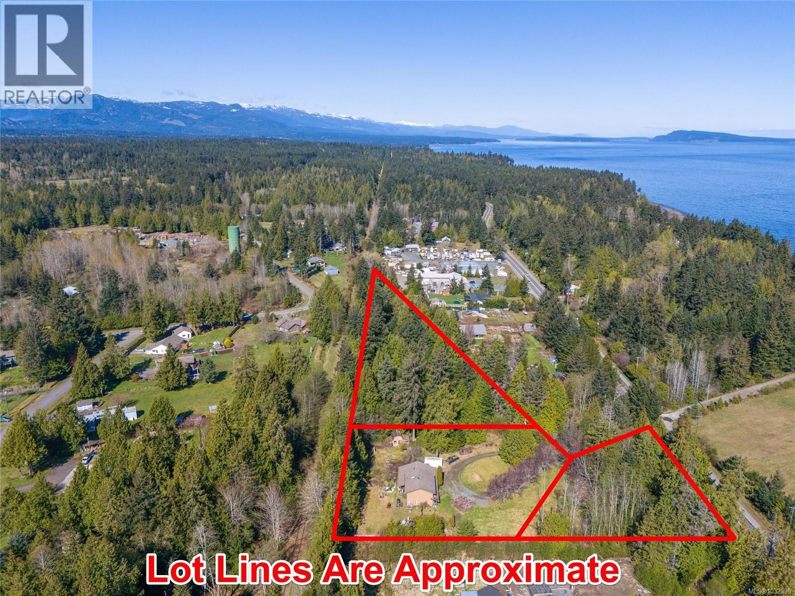 4080 Island Hwy, Qualicum Beach, British Columbia  V9K 2B1 - Photo 1 - 1032396