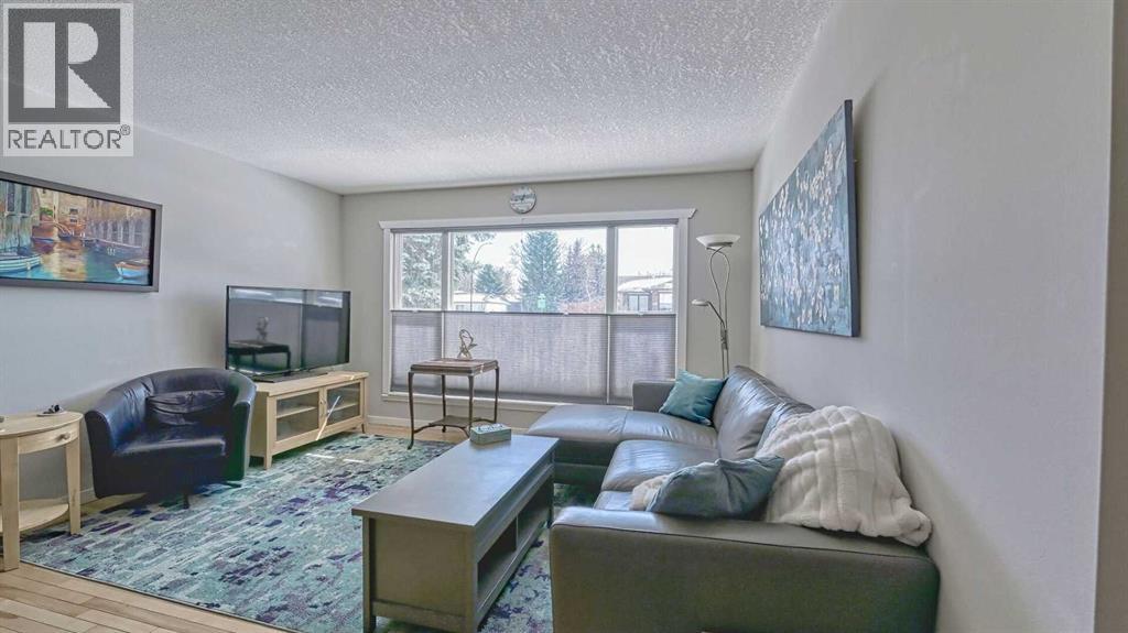 64 Midglen Drive SE, Calgary, Alberta  T2X 1G7 - Photo 4 - A2302754