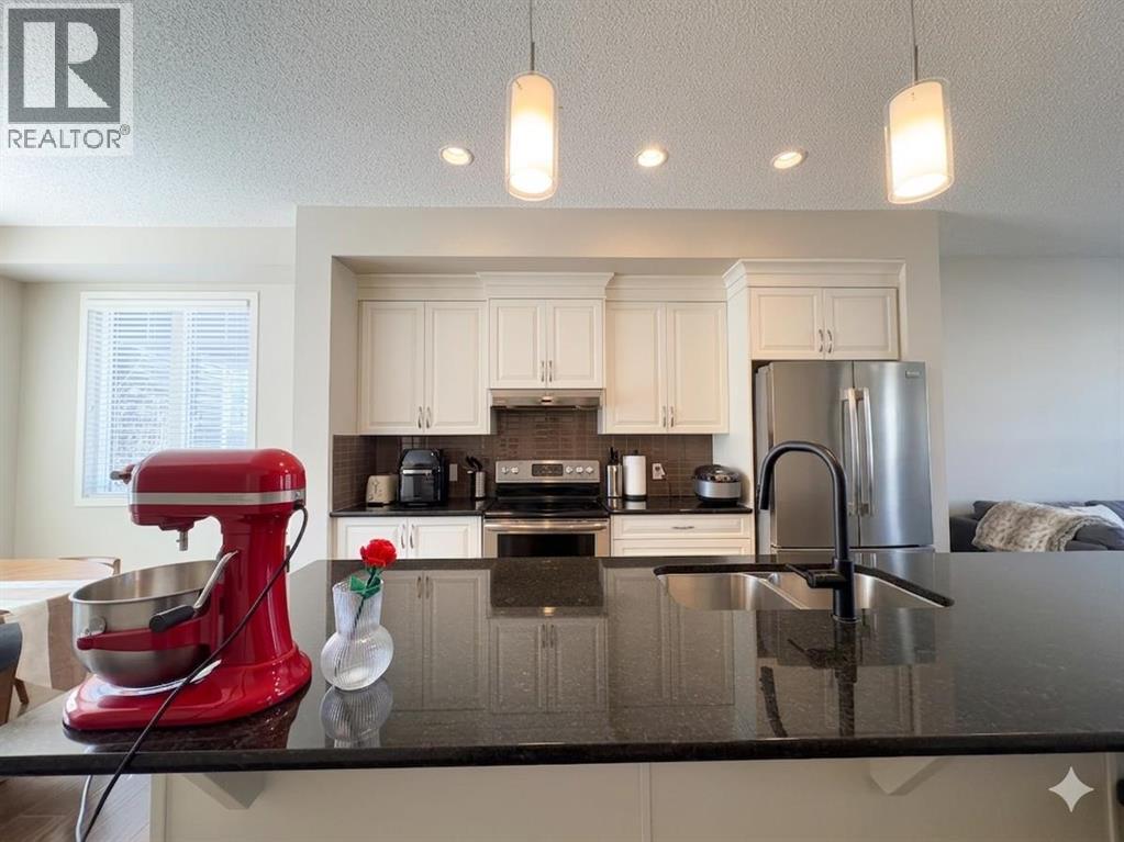 535 Panatella Walk Nw, Calgary, Alberta  T3K 0Z3 - Photo 3 - A2302413