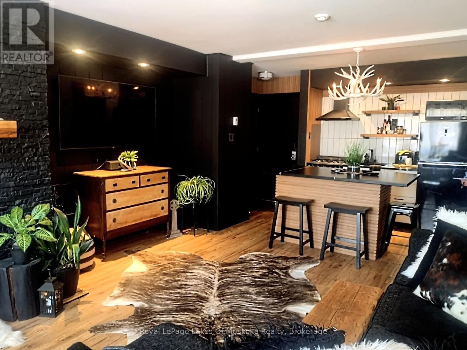 301 - 54 Summit Drive Drive, Huntsville, Ontario  P1H 2E8 - Photo 2 - X13016998