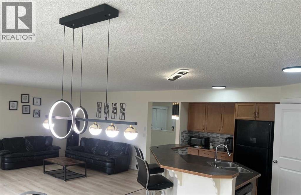 217 Coopers Grove SW, Airdrie, Alberta  T2B 0G4 - Photo 18 - A2303255