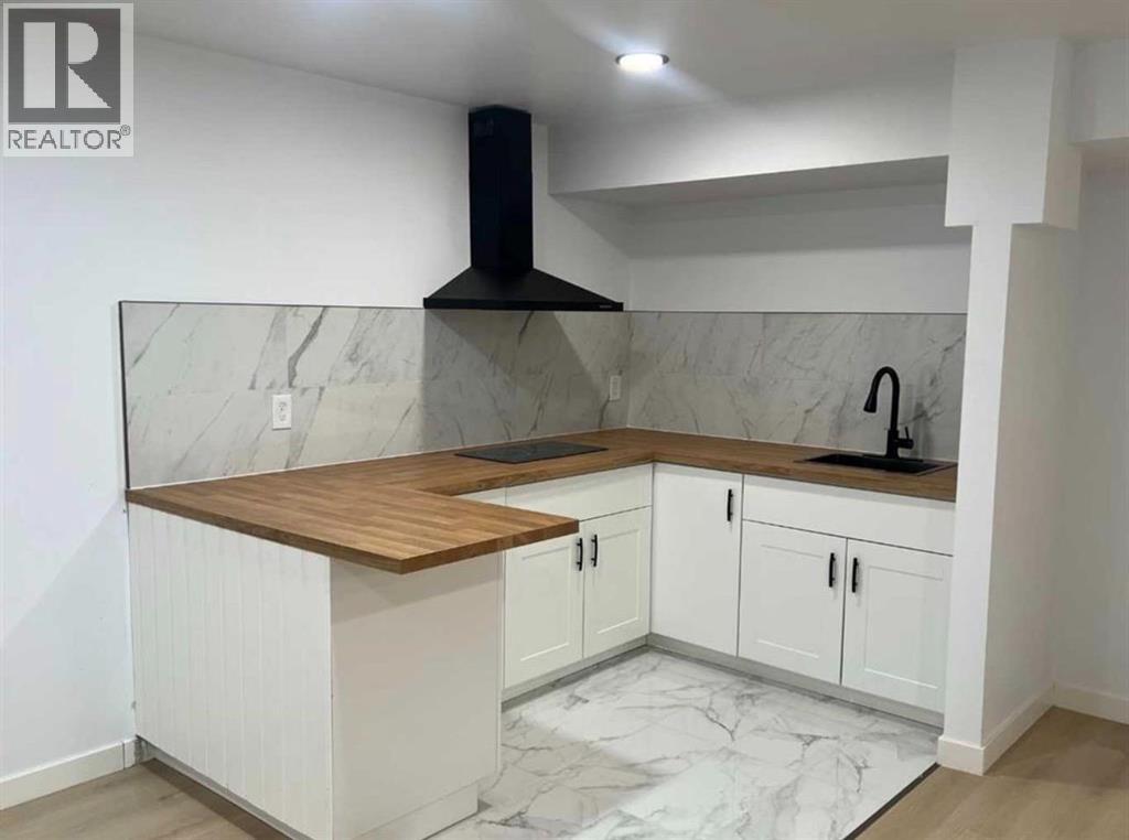 217 Coopers Grove SW, Airdrie, Alberta  T2B 0G4 - Photo 25 - A2303255