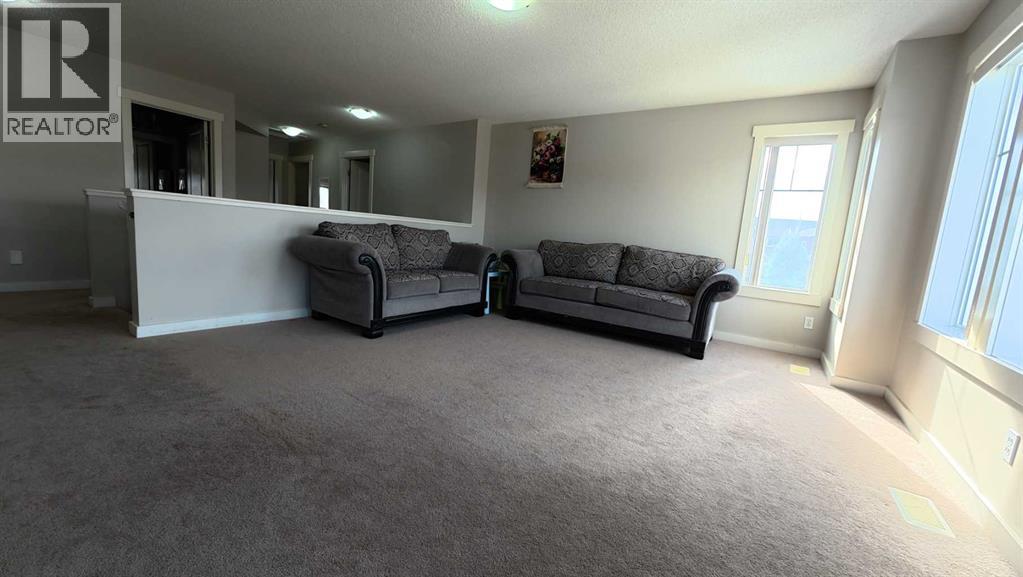 217 Coopers Grove SW, Airdrie, Alberta  T2B 0G4 - Photo 34 - A2303255