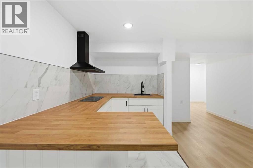 217 Coopers Grove SW, Airdrie, Alberta  T2B 0G4 - Photo 37 - A2303255