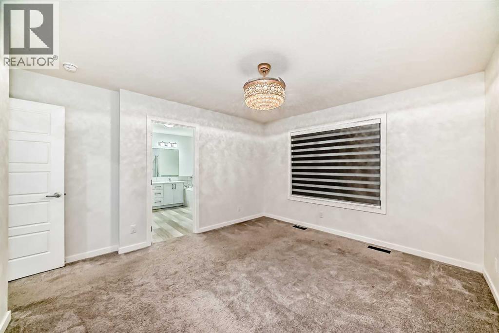 165 Savanna Passage NE, Calgary, Alberta  T3J 2J7 - Photo 21 - A2279454