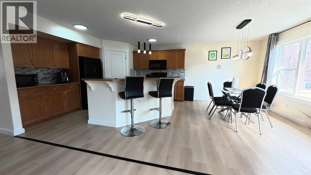 217 Coopers Grove Sw, Airdrie, Alberta  T2B 0G4 - Photo 14 - A2303255