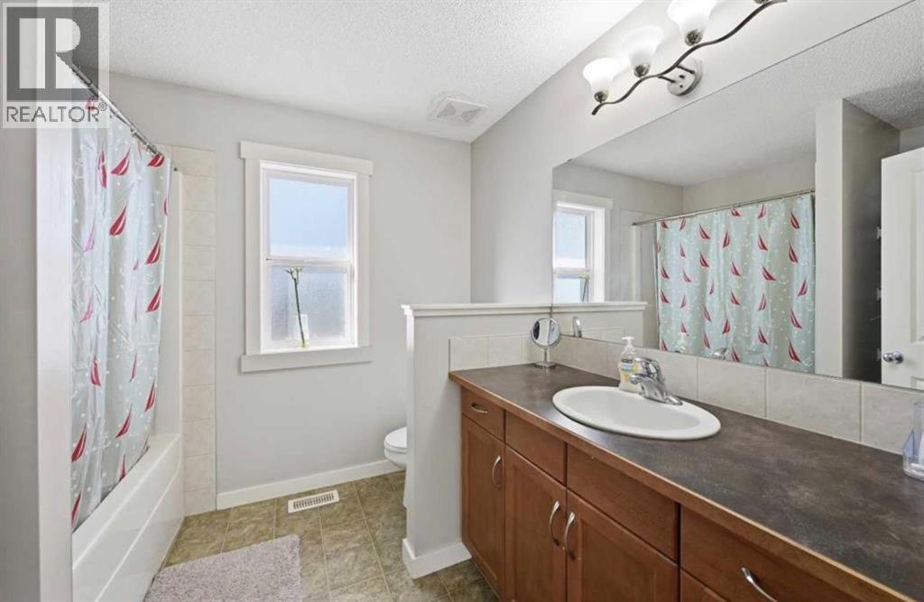 217 Coopers Grove Sw, Airdrie, Alberta  T2B 0G4 - Photo 22 - A2303255