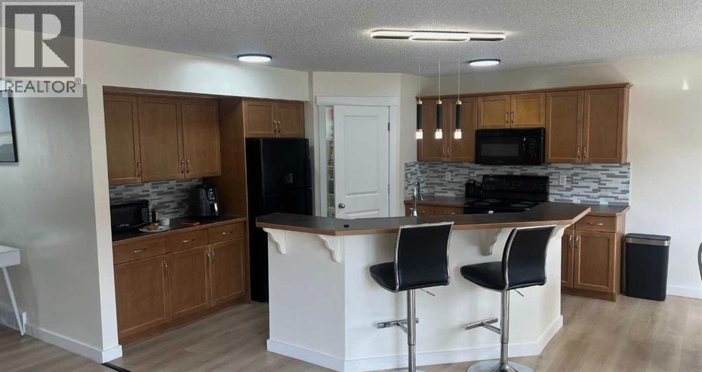 217 Coopers Grove Sw, Airdrie, Alberta  T2B 0G4 - Photo 18 - A2303255