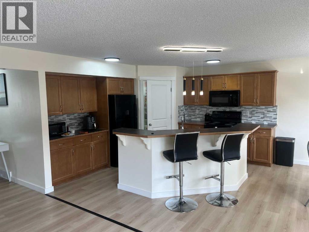 217 Coopers Grove Sw, Airdrie, Alberta  T2B 0G4 - Photo 15 - A2303255