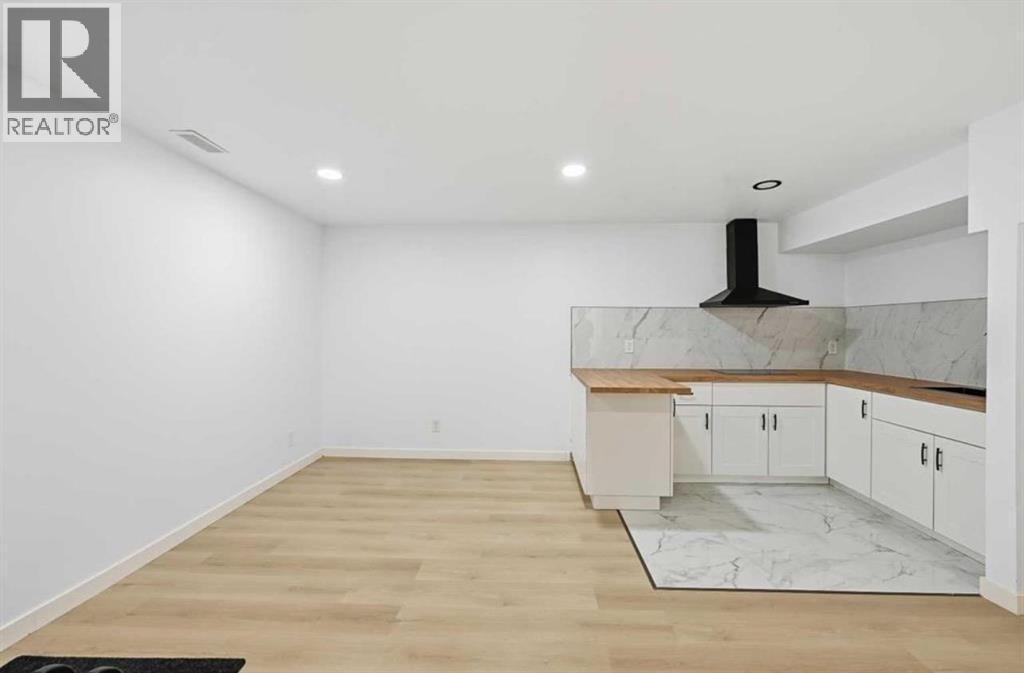 217 Coopers Grove Sw, Airdrie, Alberta  T2B 0G4 - Photo 30 - A2303255