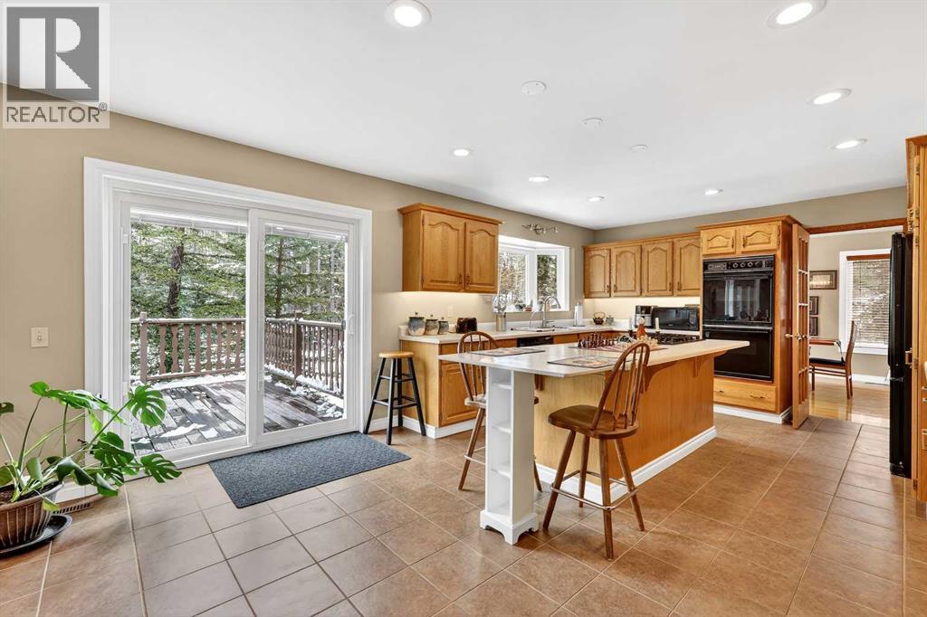 336 Wild Rose Close, Rural Rocky View County, Alberta  T0L 0K0 - Photo 7 - A2298709