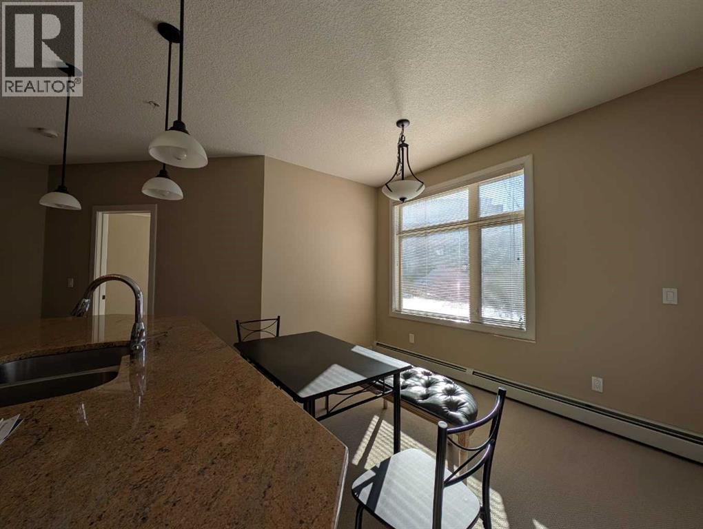 203, 35 Aspenmont Heights Sw, Calgary, Alberta  T3H 0E5 - Photo 6 - A2291530
