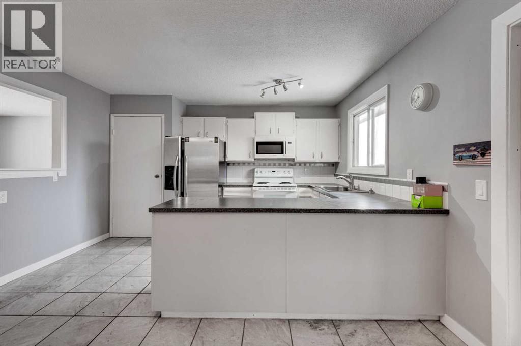 1071 Maitland Drive Ne, Calgary, Alberta  T2A 5K1 - Photo 8 - A2301895