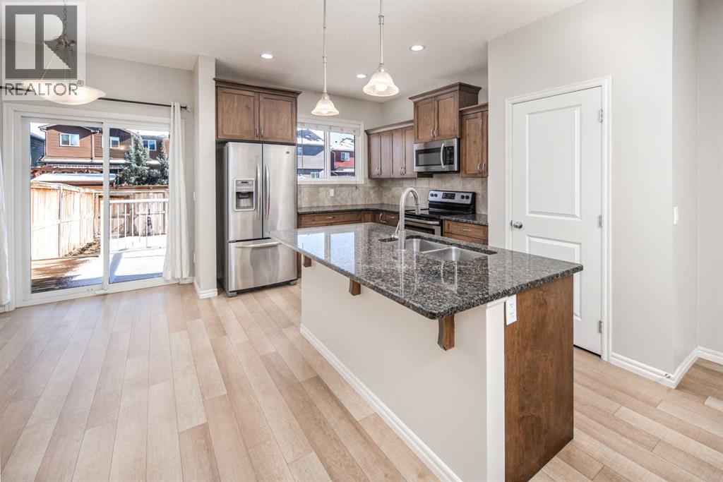 88 Legacy Mews SE, Calgary, Alberta  T2X 0Y5 - Photo 3 - A2290021