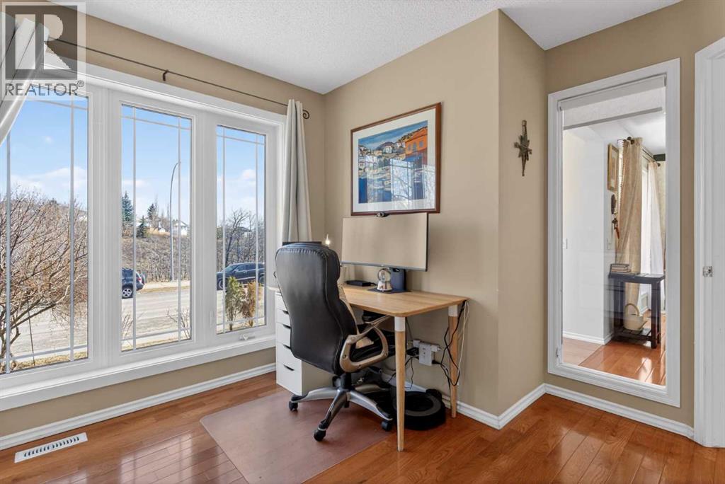 97 Tuscany Valley View Nw, Calgary, Alberta  T3L 2E8 - Photo 6 - A2298082