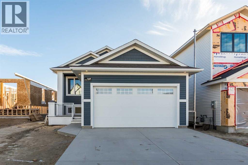 566 Malahat Green W, Lethbridge, Alberta  T1J 5H1 - Photo 2 - A2285039