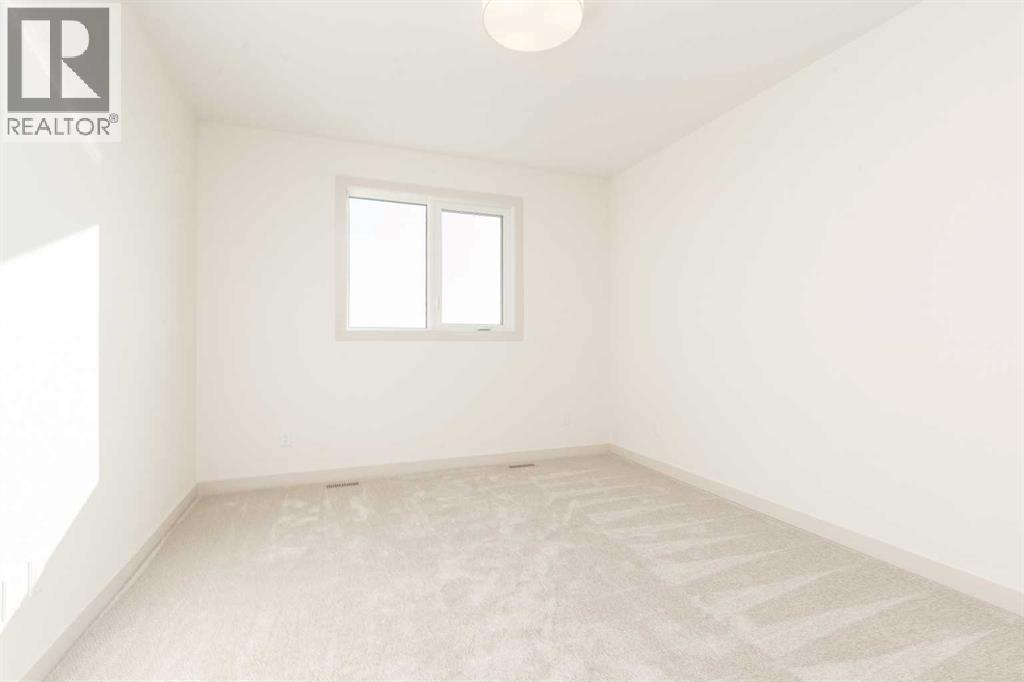 566 Malahat Green W, Lethbridge, Alberta  T1J 5H1 - Photo 15 - A2285039