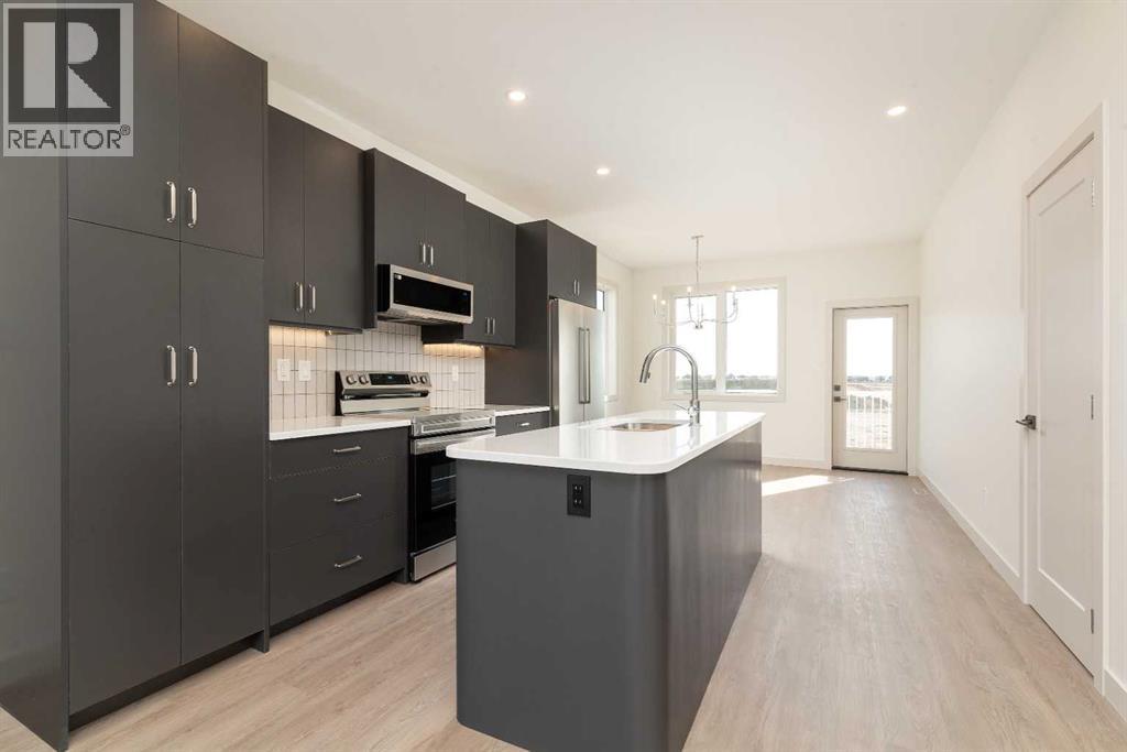 566 Malahat Green W, Lethbridge, Alberta  T1J 5H1 - Photo 7 - A2285039