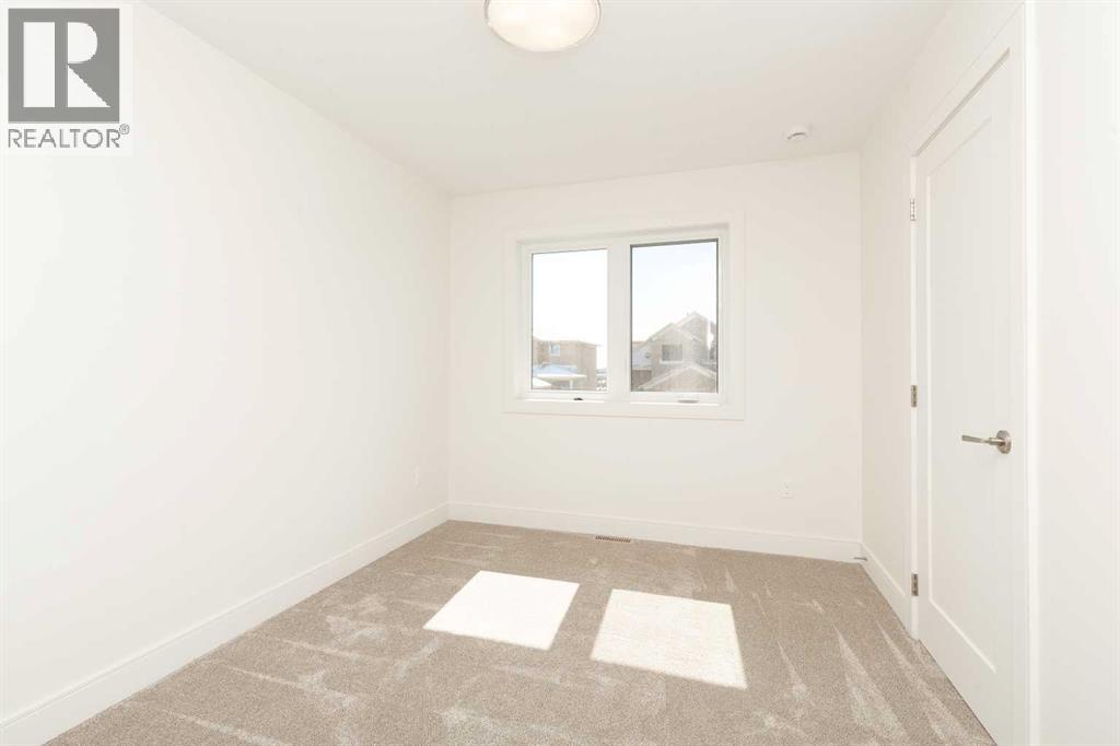 561 Malahat Green W, Lethbridge, Alberta  T1J 5H1 - Photo 18 - A2301347