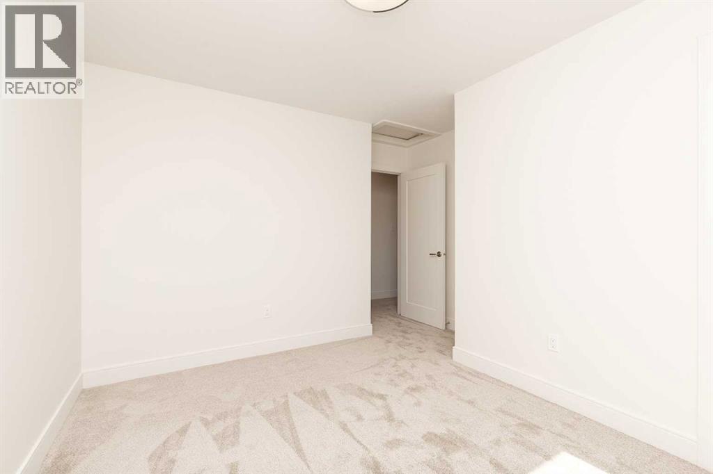 561 Malahat Green W, Lethbridge, Alberta  T1J 5H1 - Photo 21 - A2301347