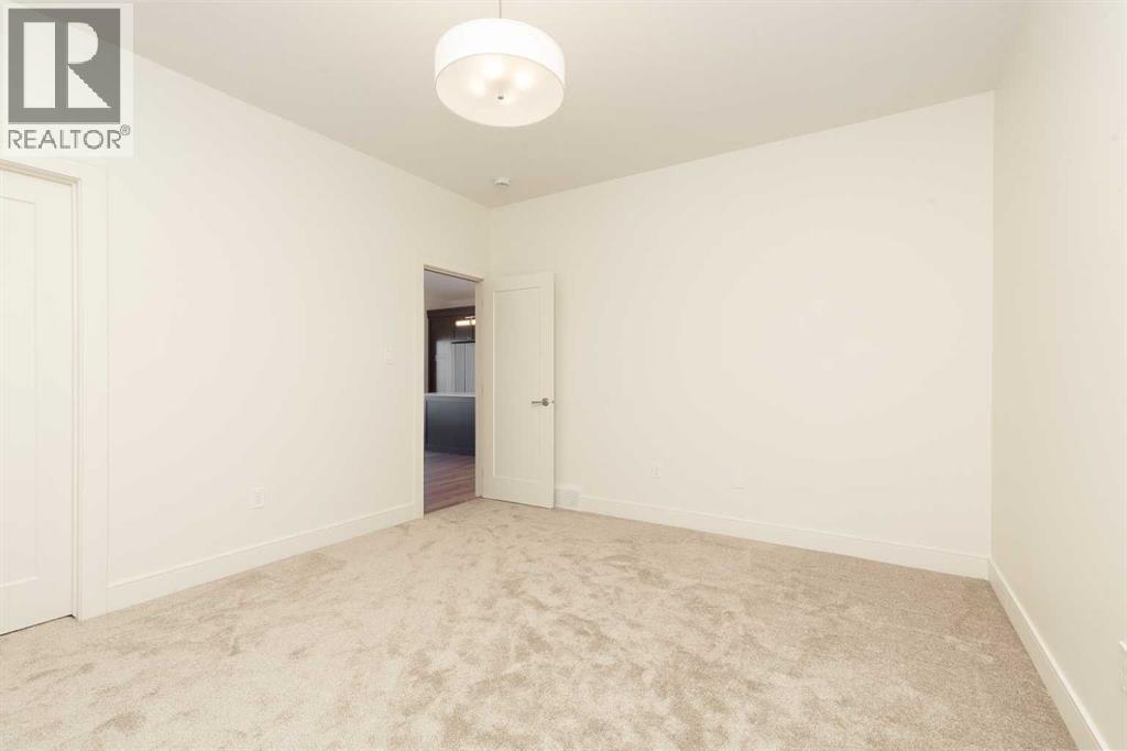 561 Malahat Green W, Lethbridge, Alberta  T1J 5H1 - Photo 14 - A2301347