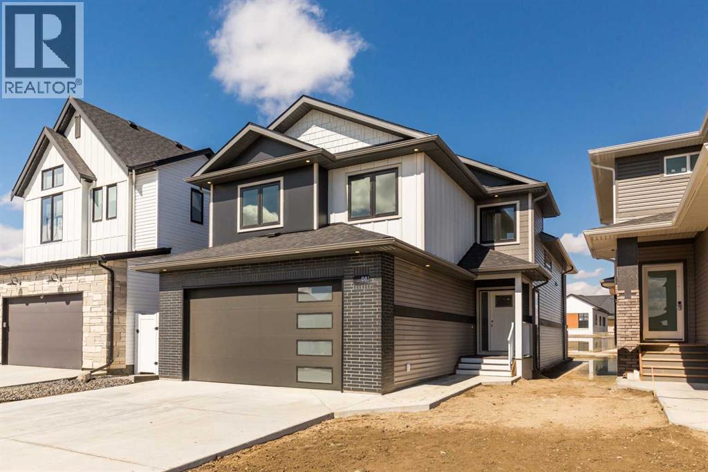 561 Malahat Green W, Lethbridge, Alberta  T1J 5H1 - Photo 2 - A2301347