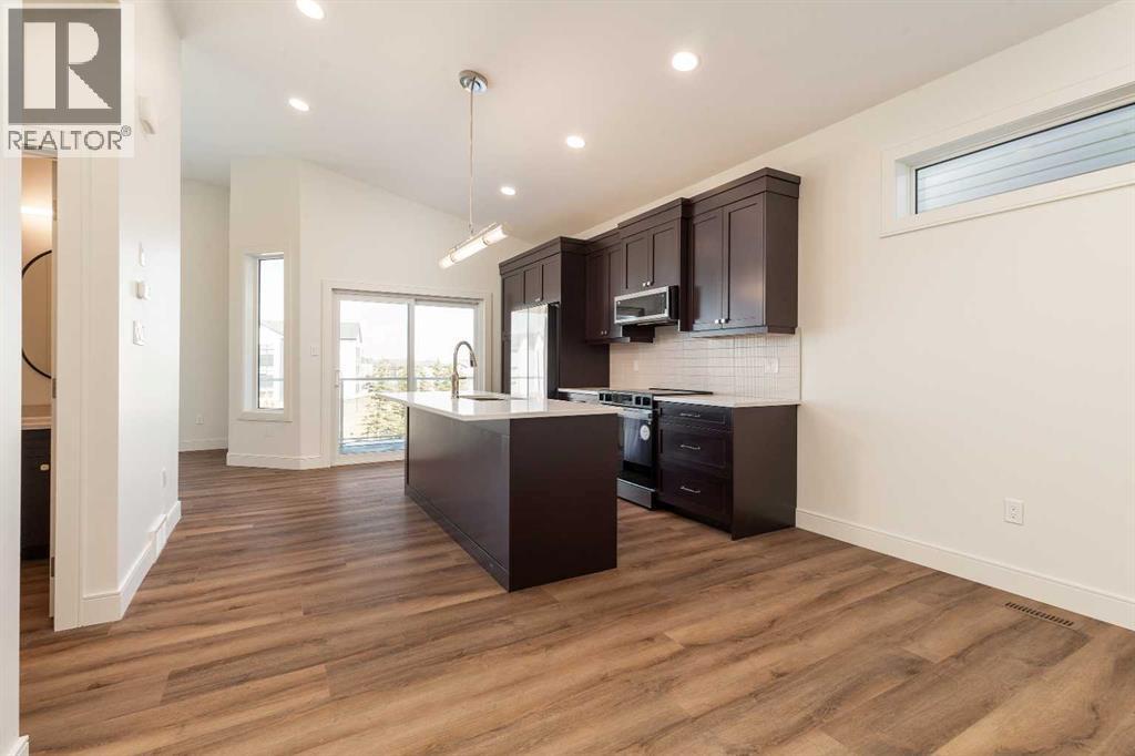 561 Malahat Green W, Lethbridge, Alberta  T1J 5H1 - Photo 6 - A2301347