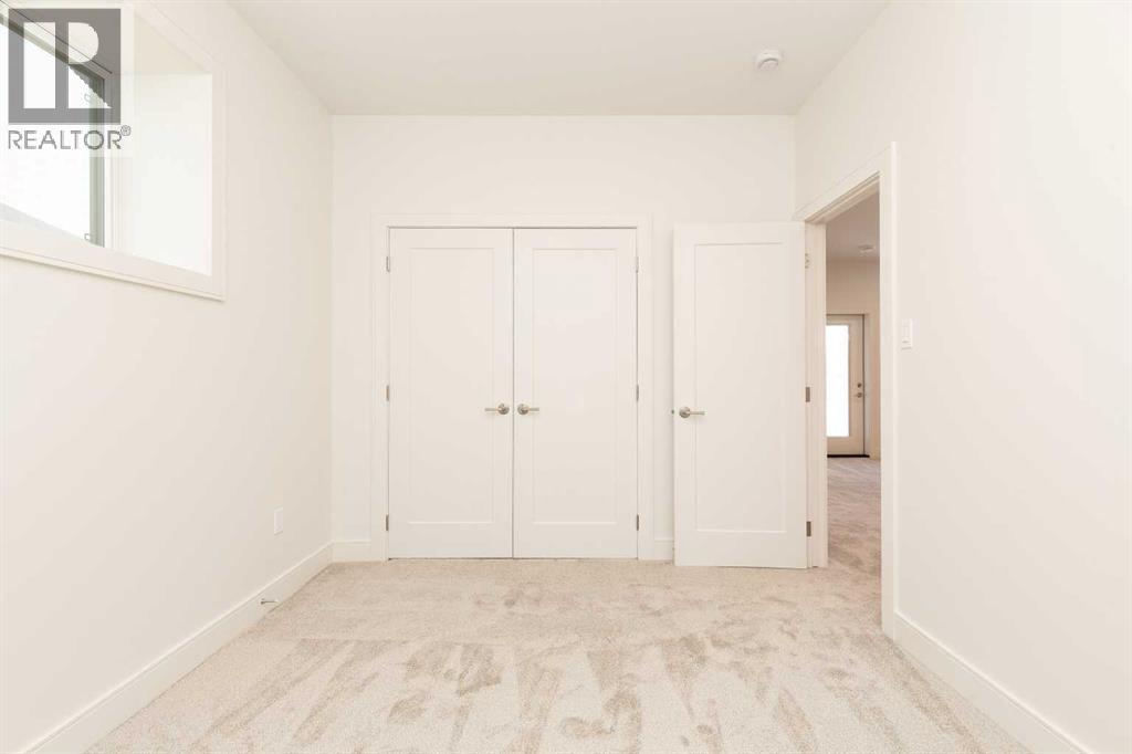 561 Malahat Green W, Lethbridge, Alberta  T1J 5H1 - Photo 28 - A2301347