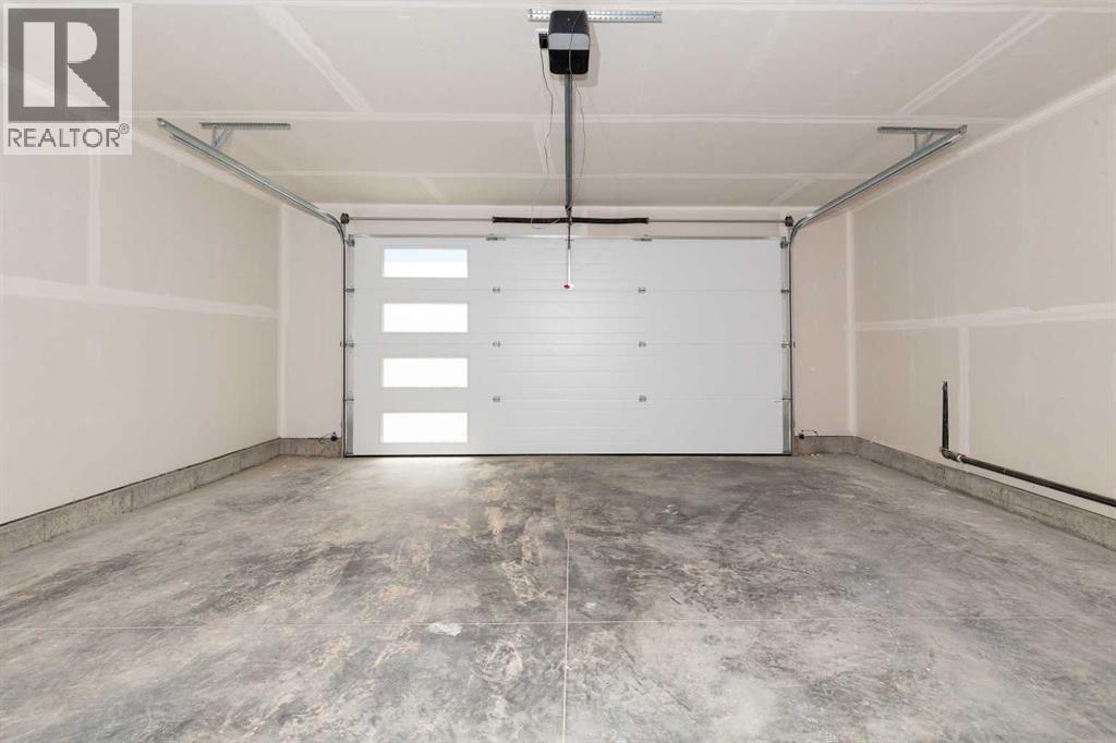 561 Malahat Green W, Lethbridge, Alberta  T1J 5H1 - Photo 31 - A2301347