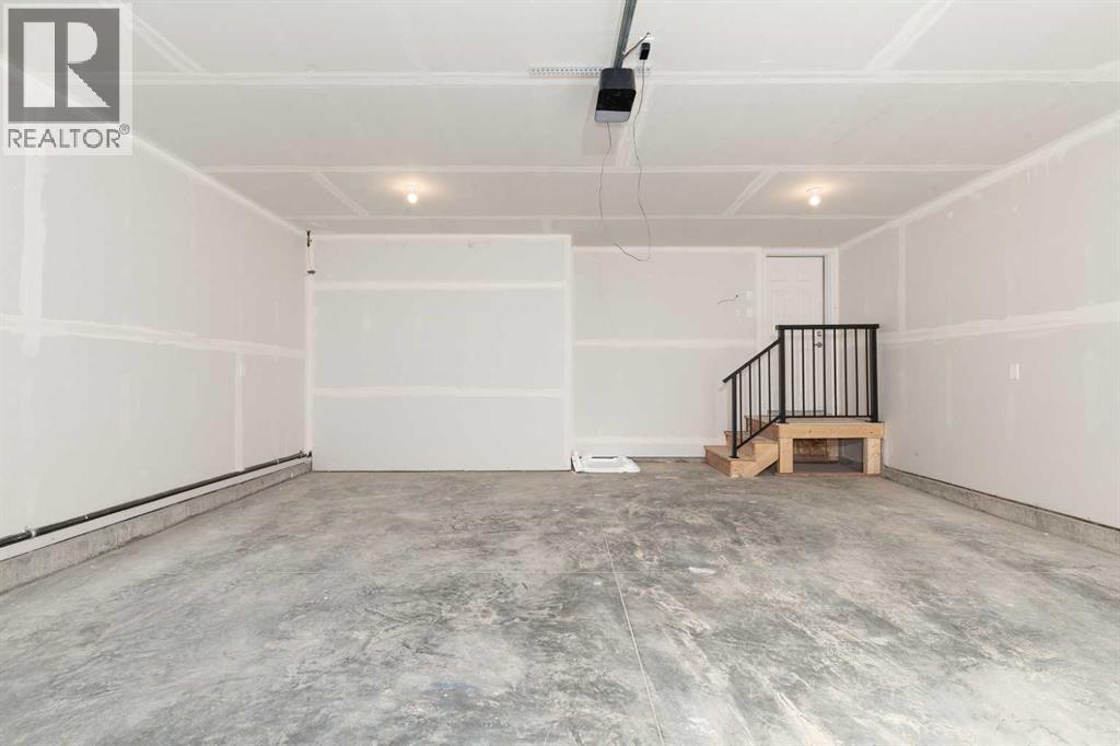 561 Malahat Green W, Lethbridge, Alberta  T1J 5H1 - Photo 32 - A2301347