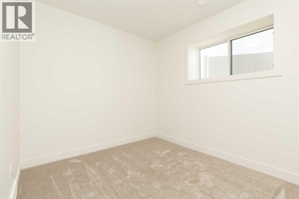 561 Malahat Green W, Lethbridge, Alberta  T1J 5H1 - Photo 27 - A2301347