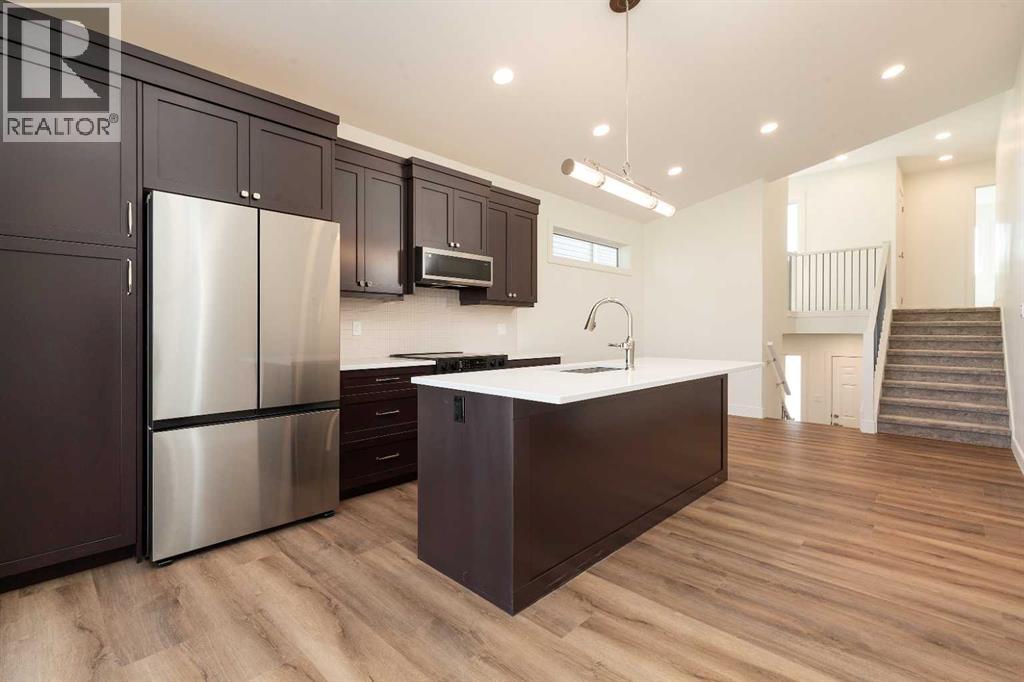 561 Malahat Green W, Lethbridge, Alberta  T1J 5H1 - Photo 7 - A2301347