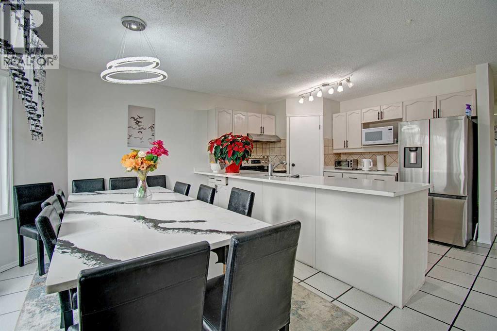 10316 Hidden Valley Drive NW, Calgary, Alberta  T3A 4Z6 - Photo 11 - A2301053