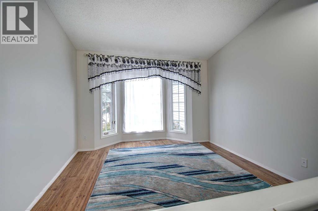 10316 Hidden Valley Drive NW, Calgary, Alberta  T3A 4Z6 - Photo 4 - A2301053