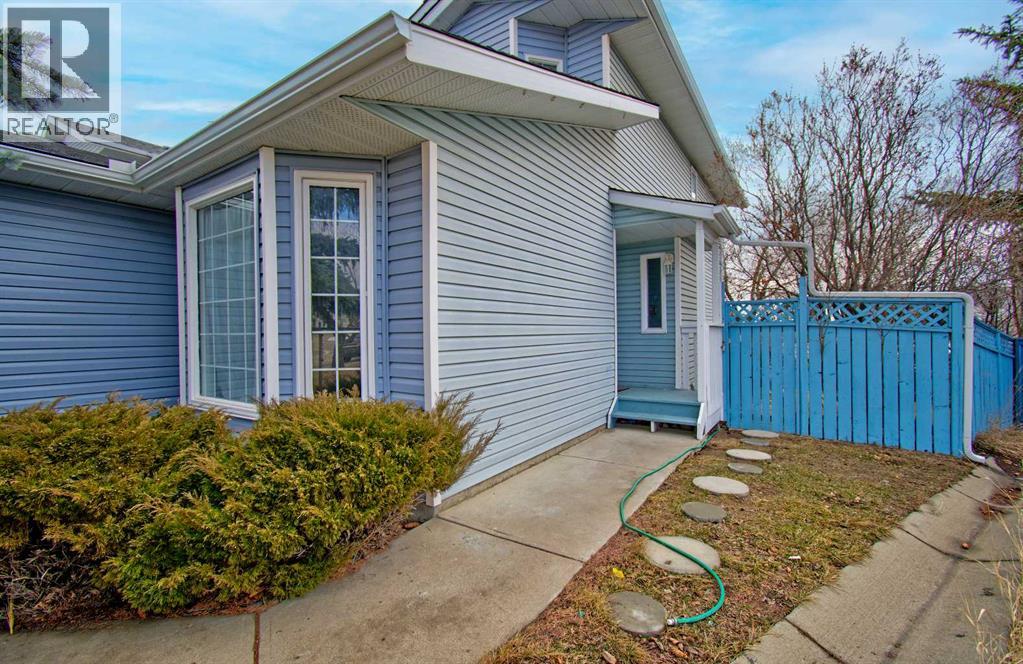 10316 Hidden Valley Drive NW, Calgary, Alberta  T3A 4Z6 - Photo 3 - A2301053