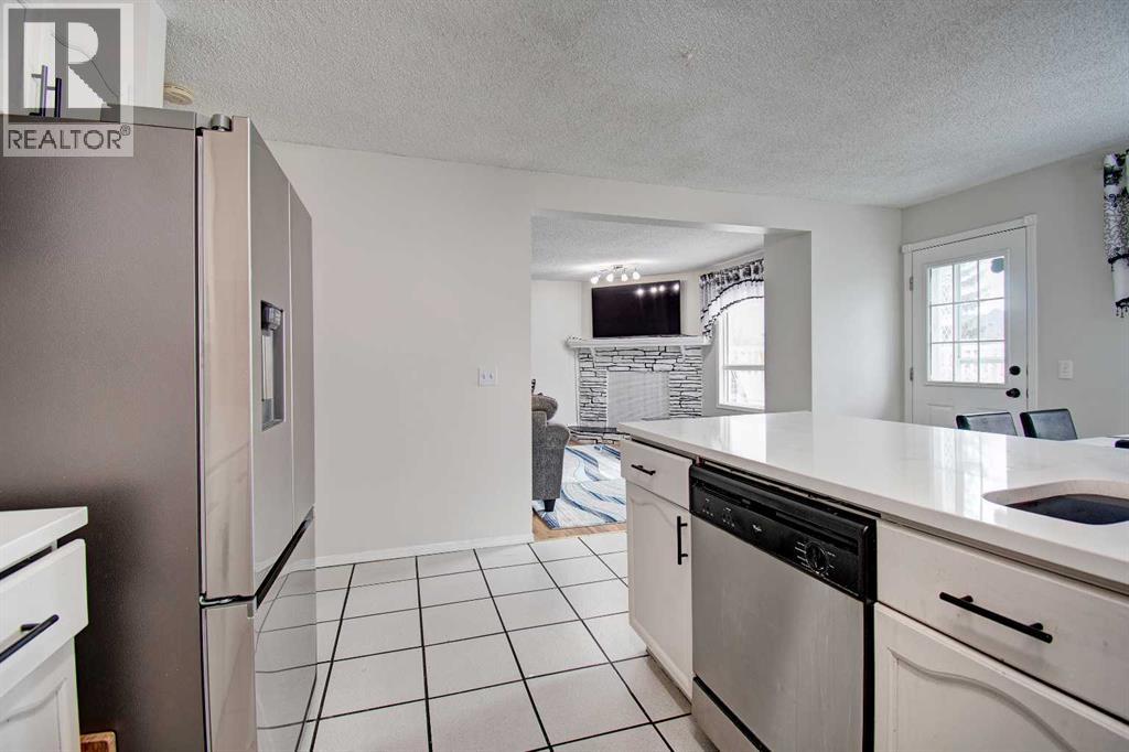 10316 Hidden Valley Drive NW, Calgary, Alberta  T3A 4Z6 - Photo 9 - A2301053