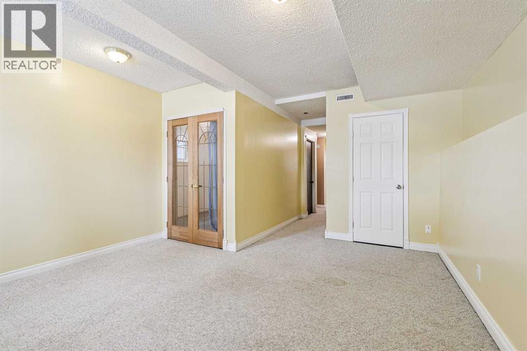 131 Woodglen Way Sw, Calgary, Alberta  T2W 4L9 - Photo 21 - A2298404