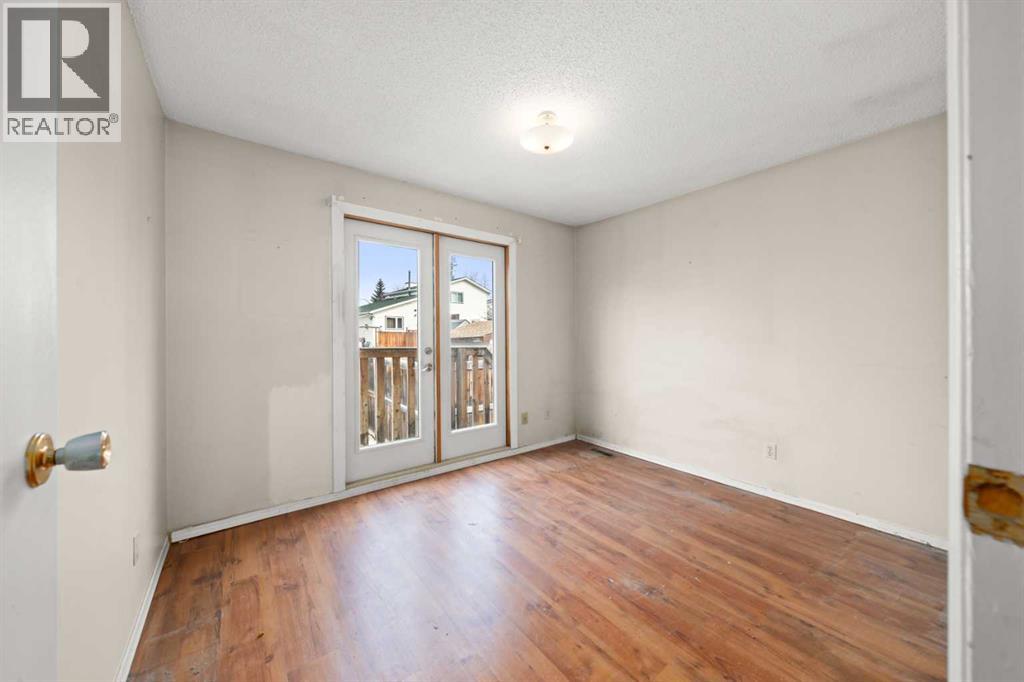 151 Deerview Court SE, Calgary, Alberta  T2J 6B6 - Photo 9 - A2292961