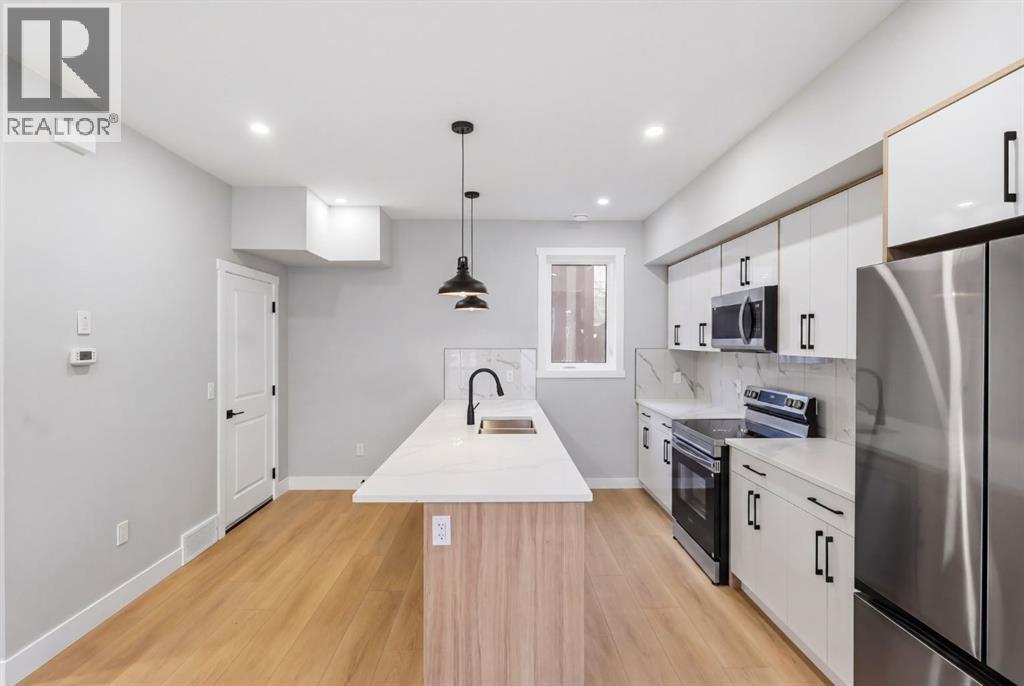 1636 19 Avenue NW, Calgary, Alberta  T2M 1B1 - Photo 9 - A2293566